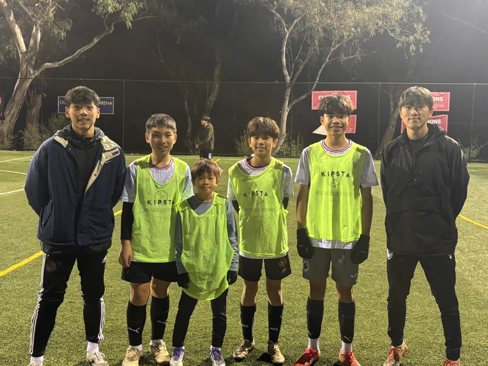 Elevate Football Academy team group photo at night session