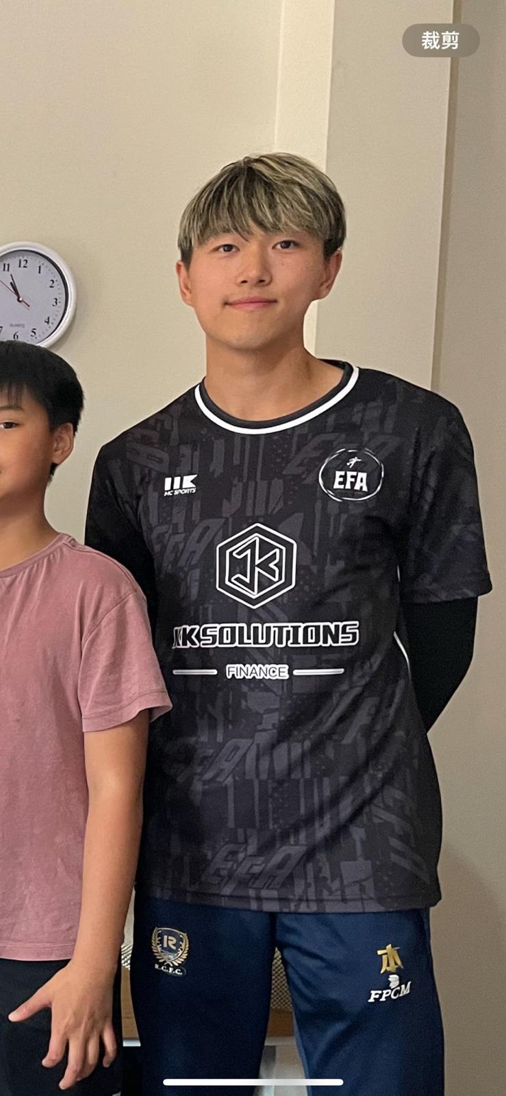 Elevate Football Academy team photo with players in white uniforms